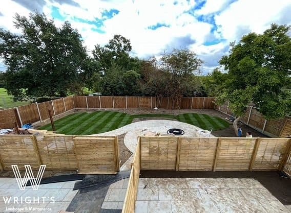 Completed turfing and planting on a new-build plot